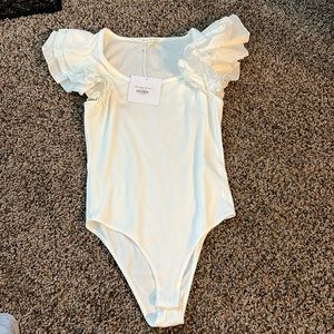 White frilly sleeve bodysuit